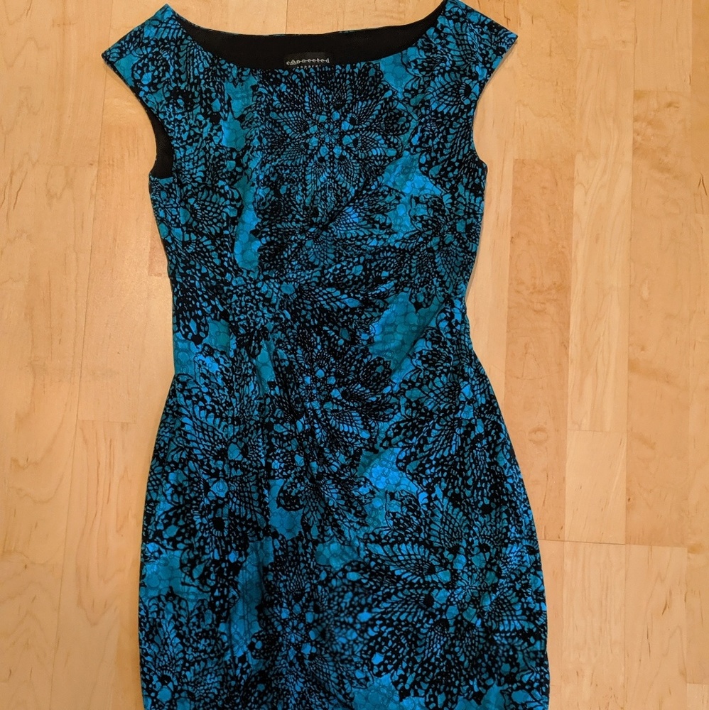 Teal dress with tulip hem